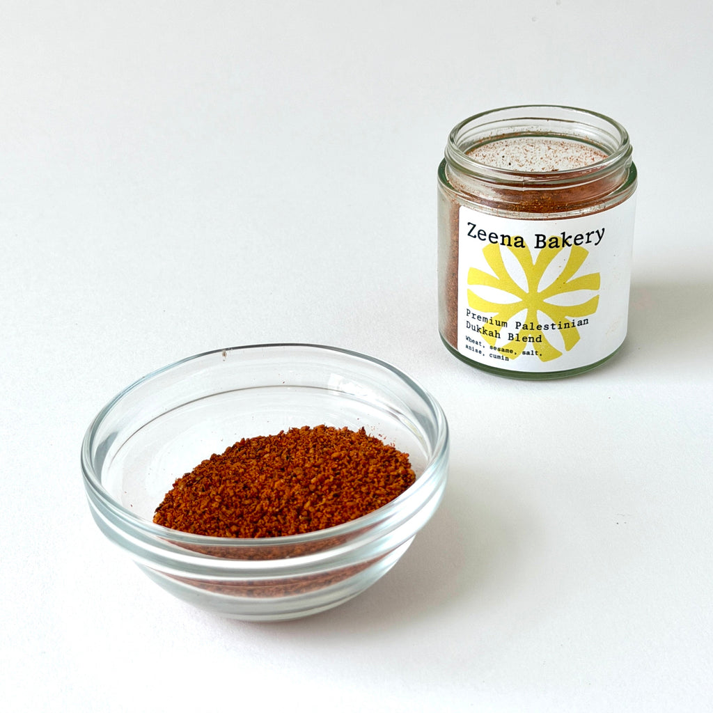 Zeena Bakery dukkah 3 oz glass jar and in a bowl