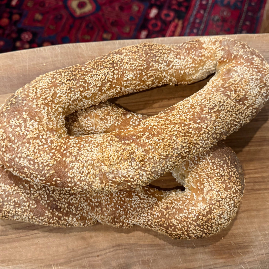 Zeena Bakery ka'ik on a wooden cutting board
