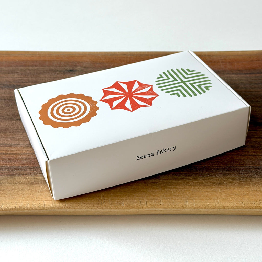 Zeena Bakery mixed maamoul cookies (date, walnut, and pistachio) in a closed box