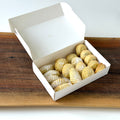 Zeena Bakery mixed maamoul cookies (date, walnut, and pistachio) in an open box