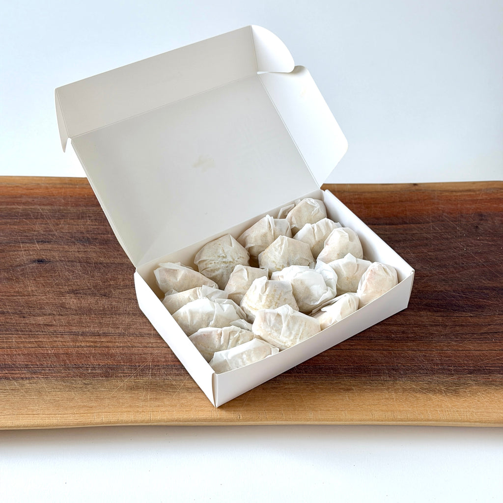 Zeena Bakery mixed maamoul cookies (date, walnut, and pistachio) individually wrapped in an open box