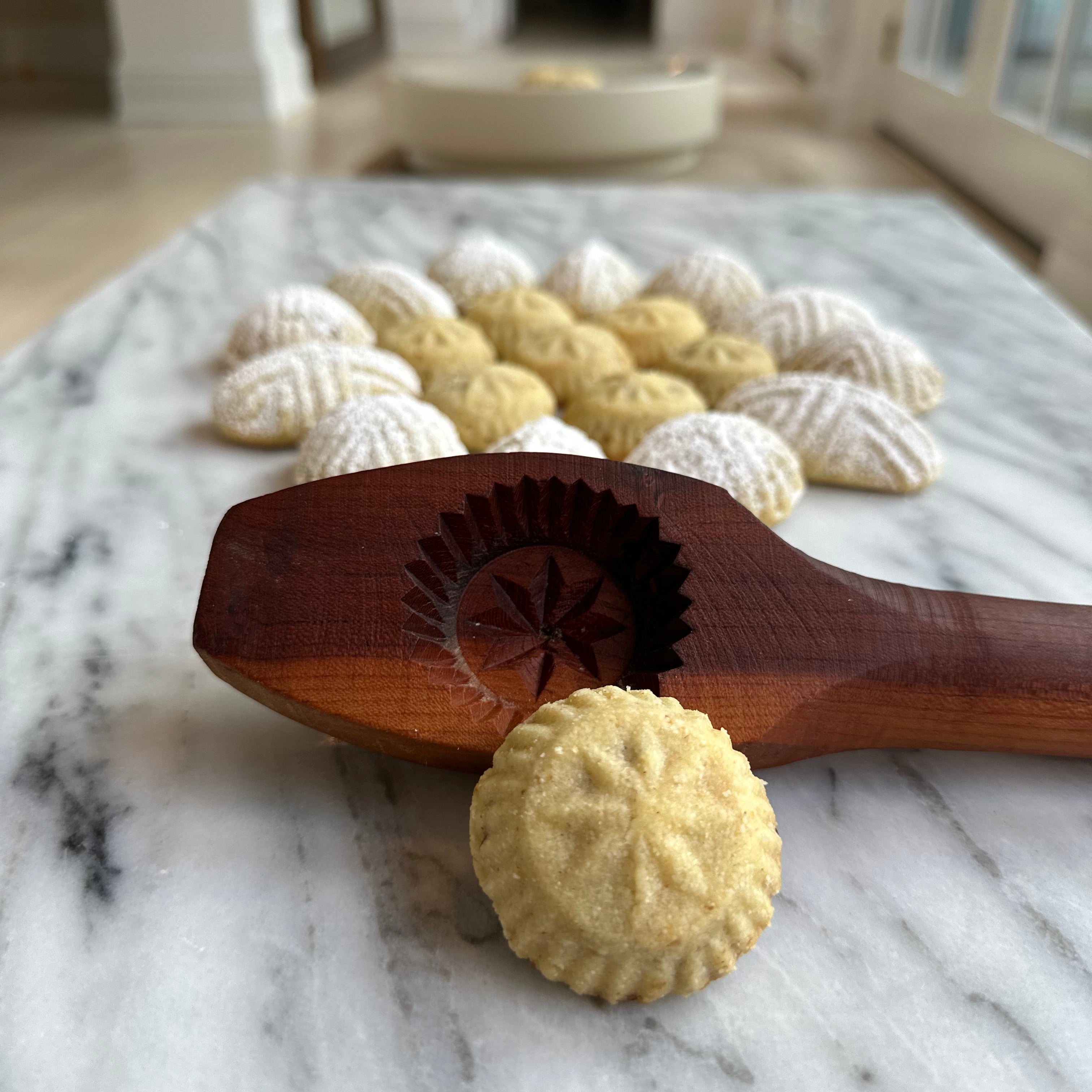 Zeena Bakery date maamoul cookie, popped out of a wooden mold